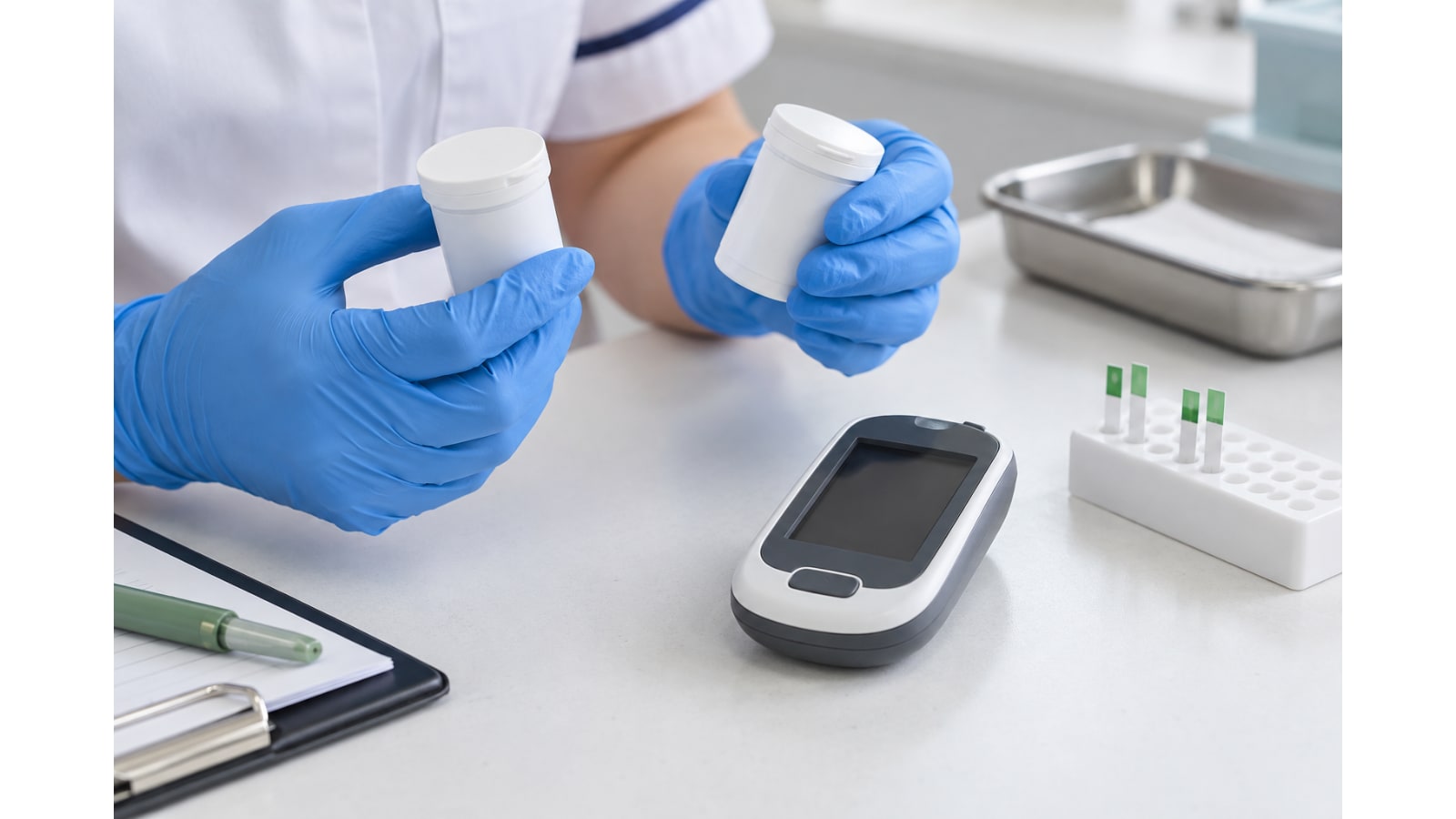 Illustrative gloved hands holding plain containers beside an unbranded testing meter on a clinical worktop.
